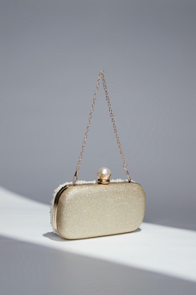 Peral embellishment clutch