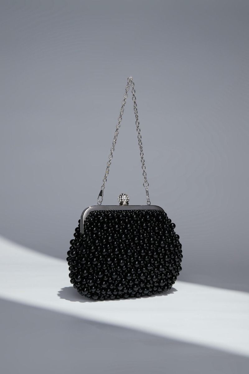 Peral embellishment clutch