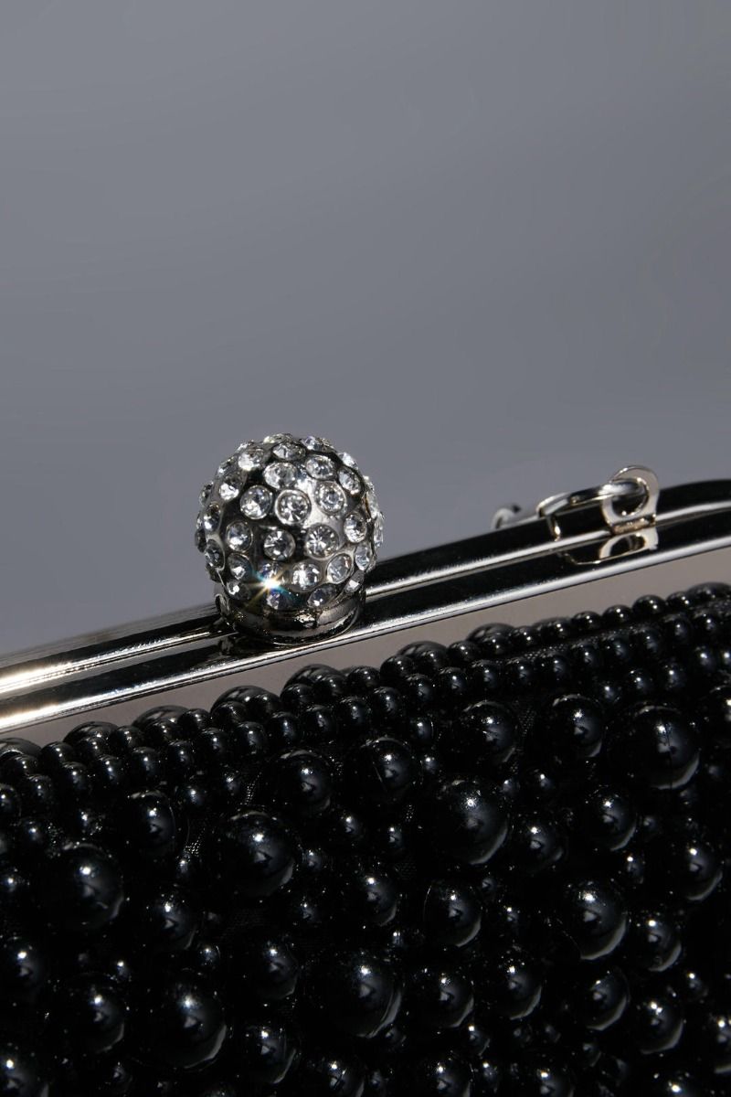 Peral embellishment clutch