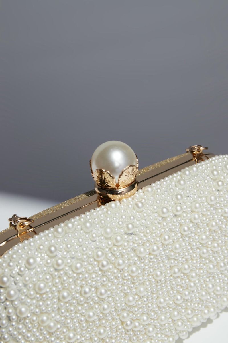 Peral embellishment clutch