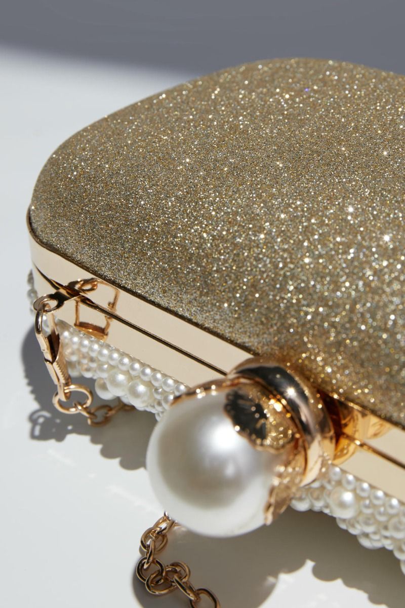 Peral embellishment clutch