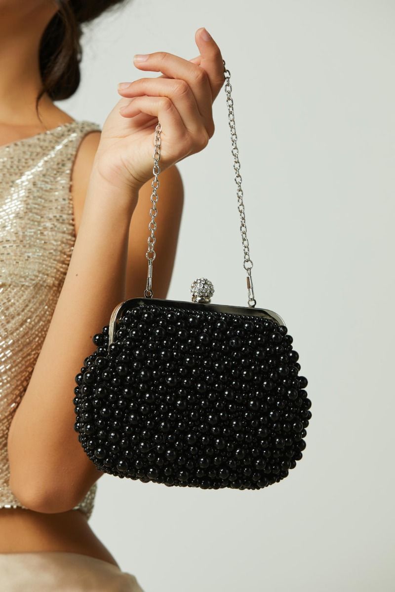 Peral embellishment clutch