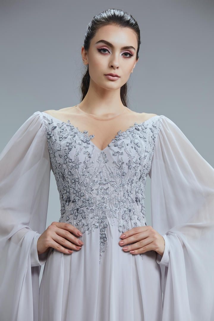 Embellished cape sleeves dress